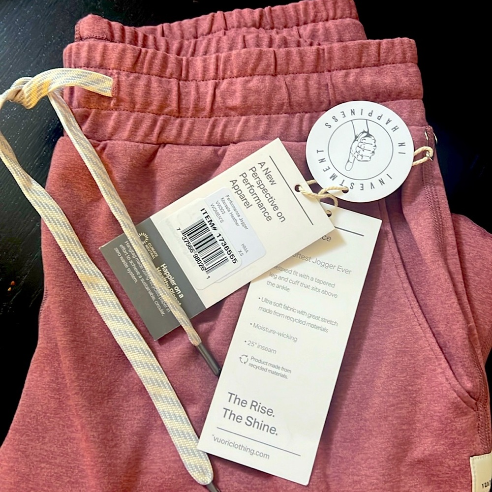 Brand new Vuori performance joggers with tags. Color is Marsala Heather.